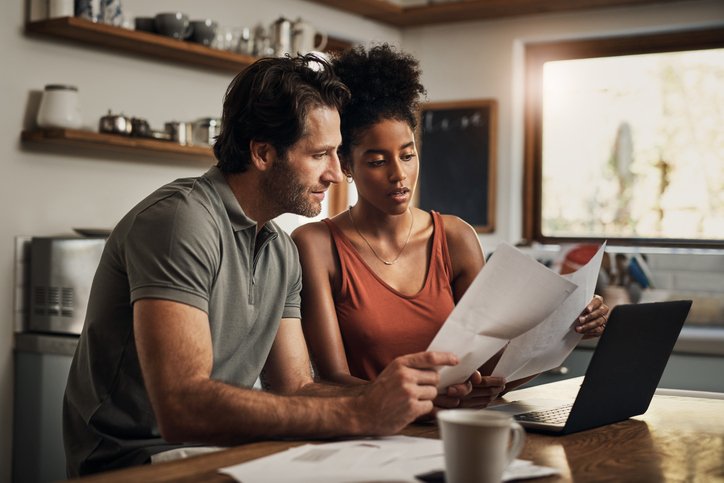 couple looking at documents